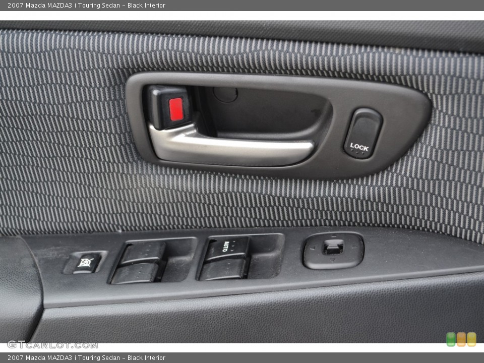 Black Interior Controls for the 2007 Mazda MAZDA3 i Touring Sedan #78208155