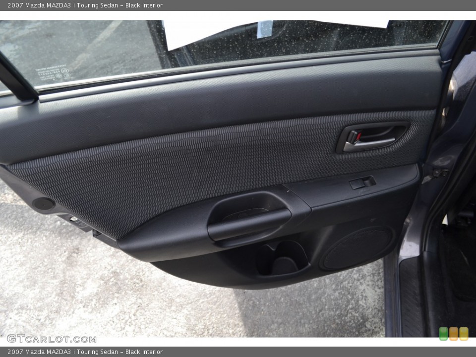 Black Interior Door Panel for the 2007 Mazda MAZDA3 i Touring Sedan #78208257