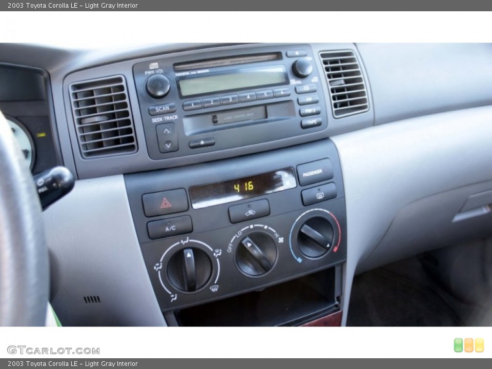 Light Gray Interior Controls for the 2003 Toyota Corolla LE #78218014