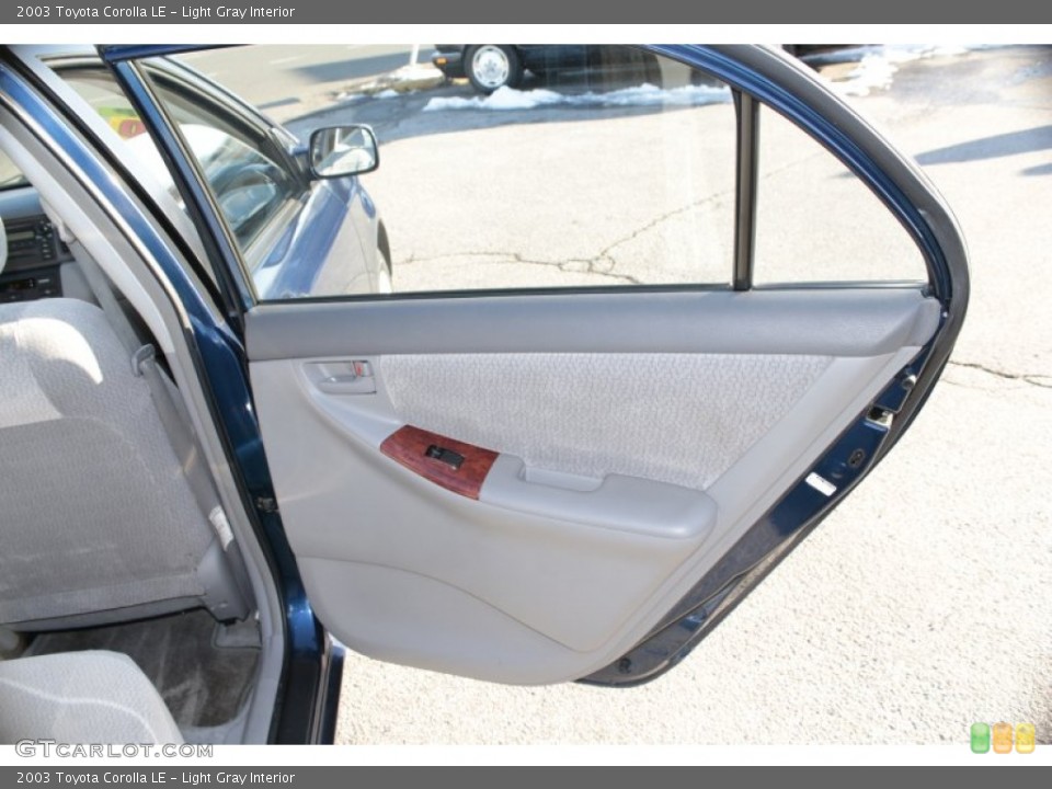Light Gray Interior Door Panel for the 2003 Toyota Corolla LE #78218101