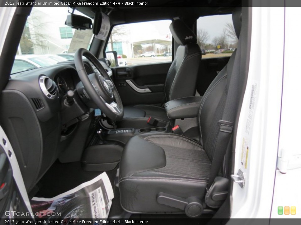 Black Interior Photo for the 2013 Jeep Wrangler Unlimited Oscar Mike Freedom Edition 4x4 #78222988