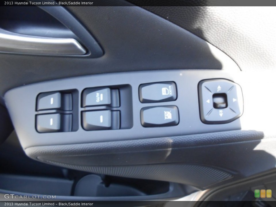 Black/Saddle Interior Controls for the 2013 Hyundai Tucson Limited #78230047