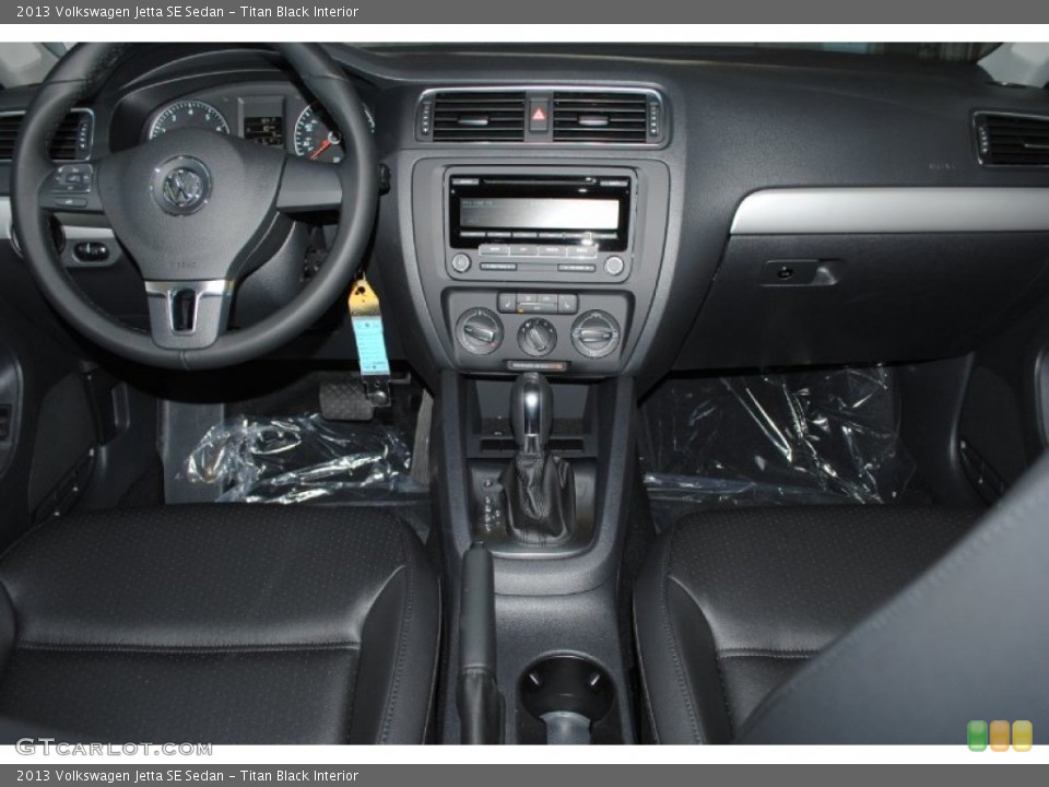 Titan Black Interior Dashboard for the 2013 Volkswagen Jetta SE Sedan #78232120