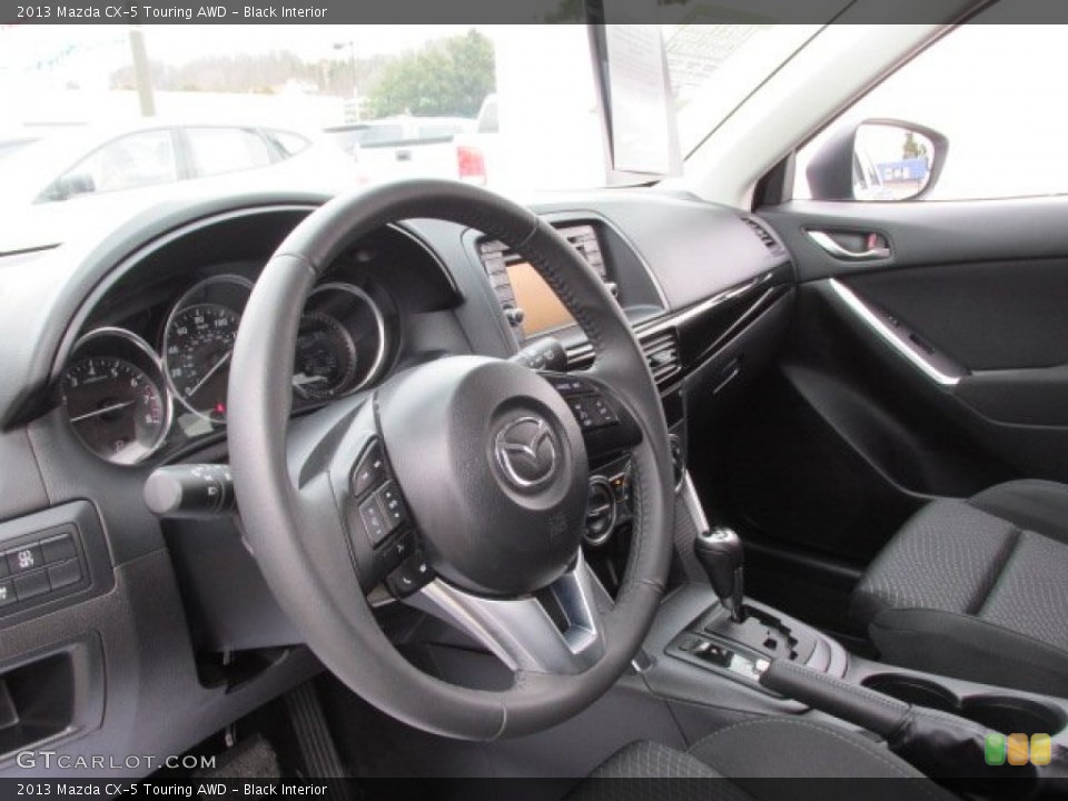 Black Interior Dashboard for the 2013 Mazda CX-5 Touring AWD #78250795