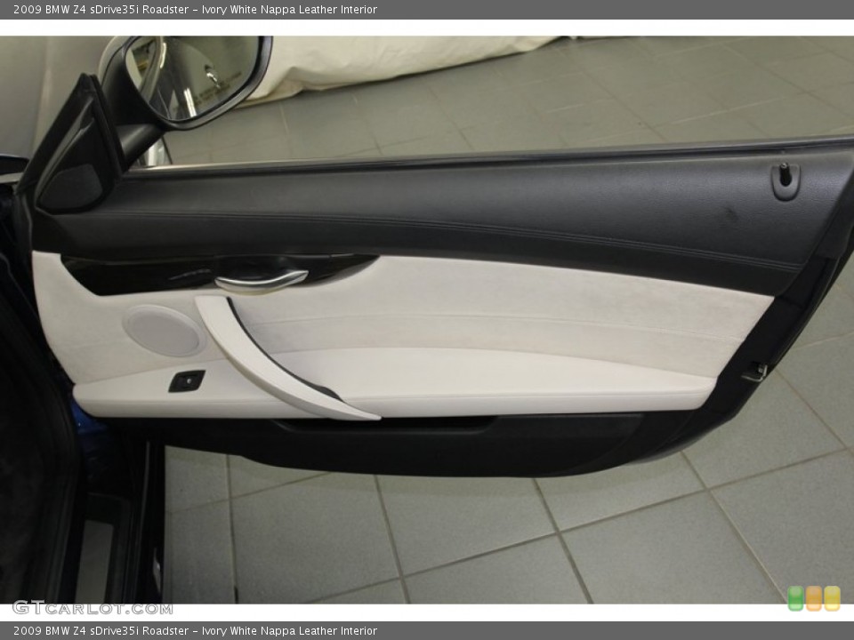 Ivory White Nappa Leather Interior Door Panel for the 2009 BMW Z4 sDrive35i Roadster #78271894