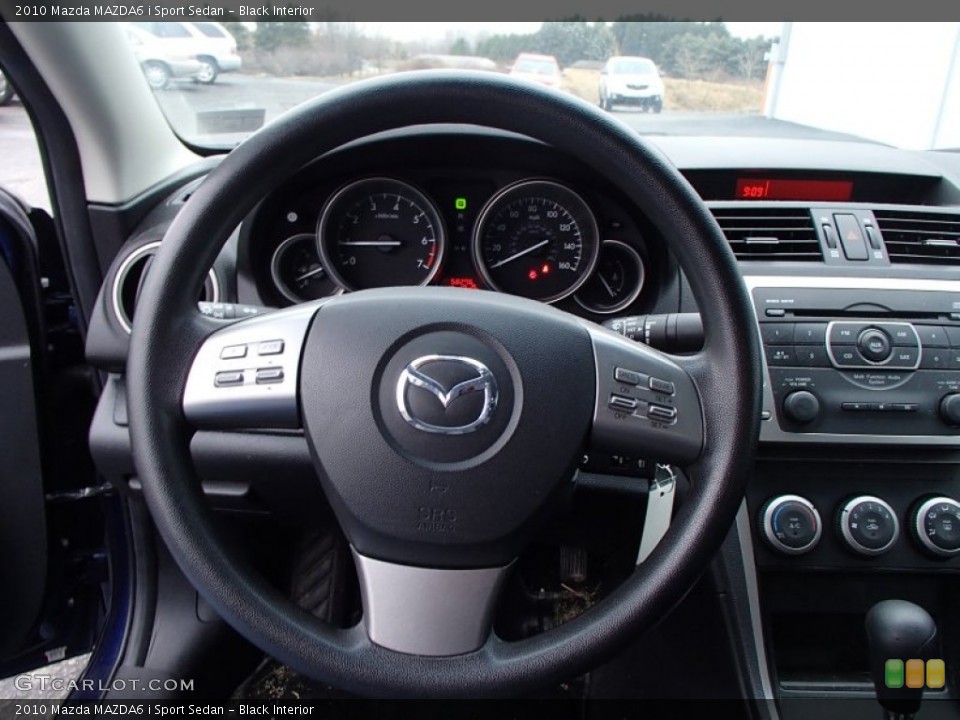 Black Interior Steering Wheel for the 2010 Mazda MAZDA6 i Sport Sedan #78276206