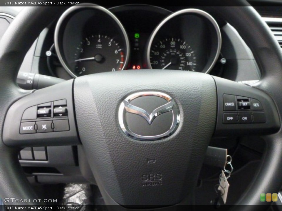 Black Interior Controls for the 2013 Mazda MAZDA5 Sport #78290140