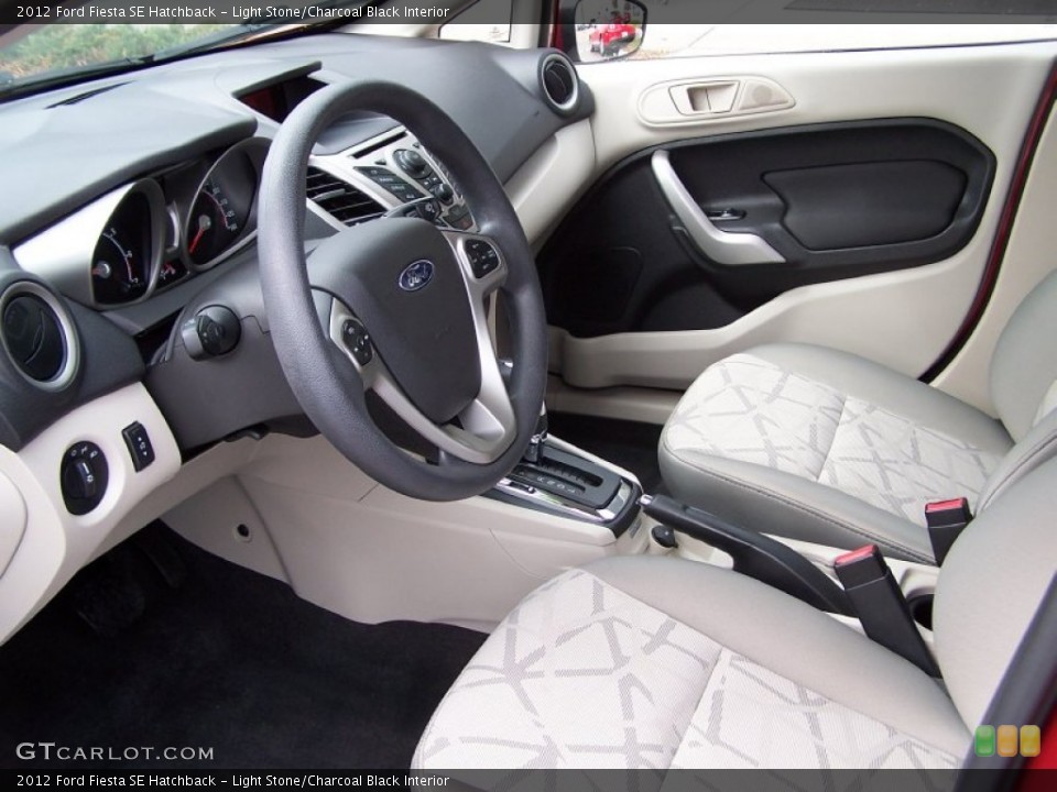 Light Stone/Charcoal Black Interior Prime Interior for the 2012 Ford Fiesta SE Hatchback #78290330