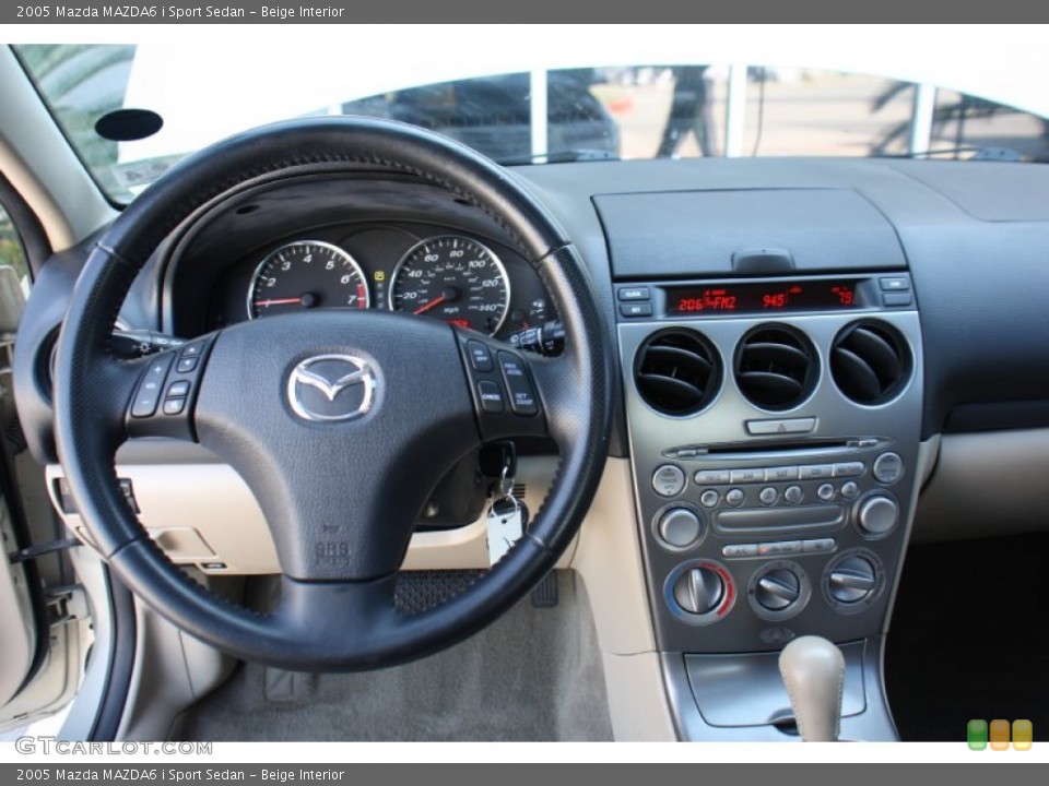 Beige Interior Dashboard for the 2005 Mazda MAZDA6 i Sport Sedan #78294286