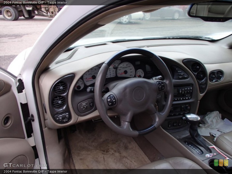 Taupe Interior Dashboard for the 2004 Pontiac Bonneville GXP #78313621