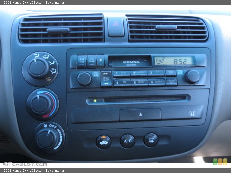 Beige Interior Controls for the 2002 Honda Civic LX Sedan #78314617