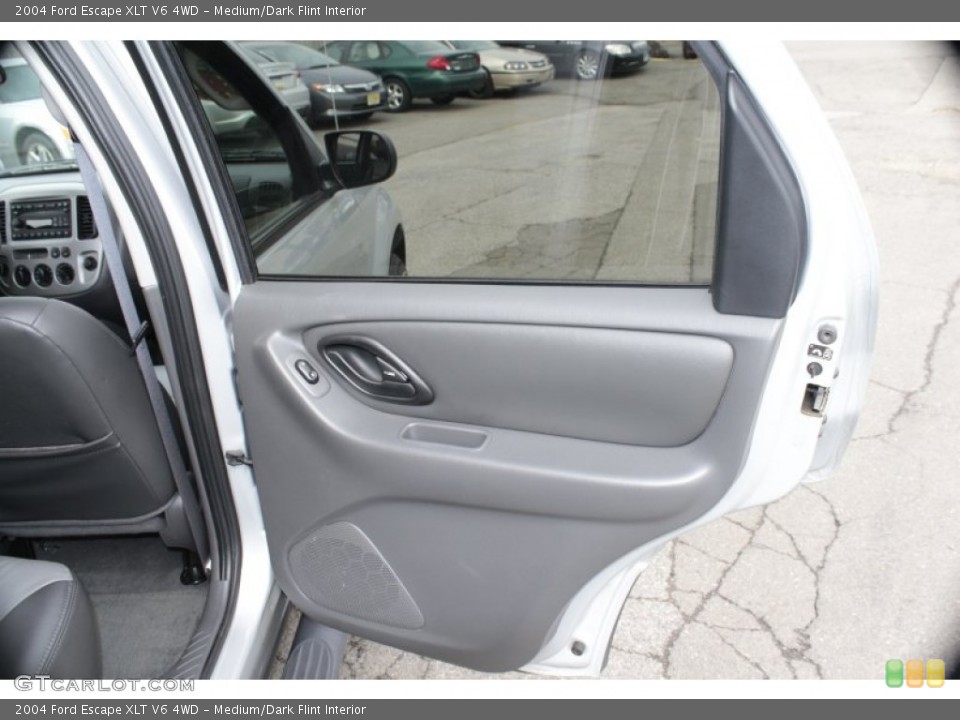Medium/Dark Flint Interior Door Panel for the 2004 Ford Escape XLT V6 4WD #78324897