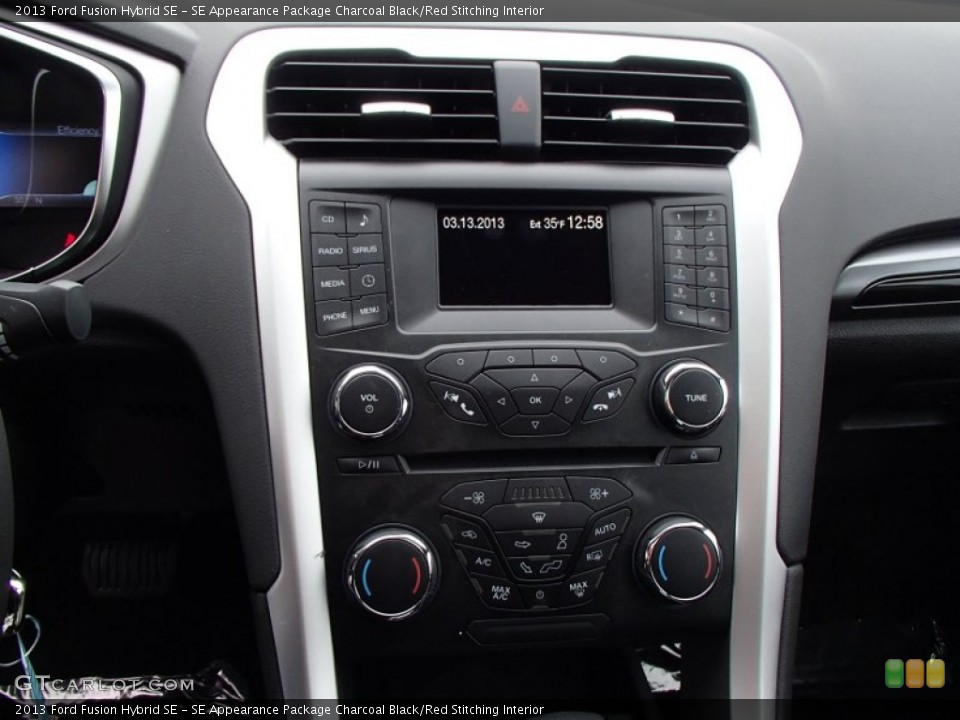 SE Appearance Package Charcoal Black/Red Stitching Interior Controls for the 2013 Ford Fusion Hybrid SE #78335646