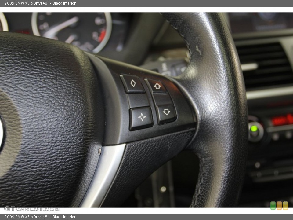 Black Interior Controls for the 2009 BMW X5 xDrive48i #78339259