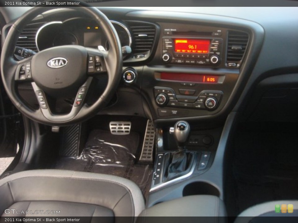 Black Sport Interior Dashboard for the 2011 Kia Optima SX #78350185