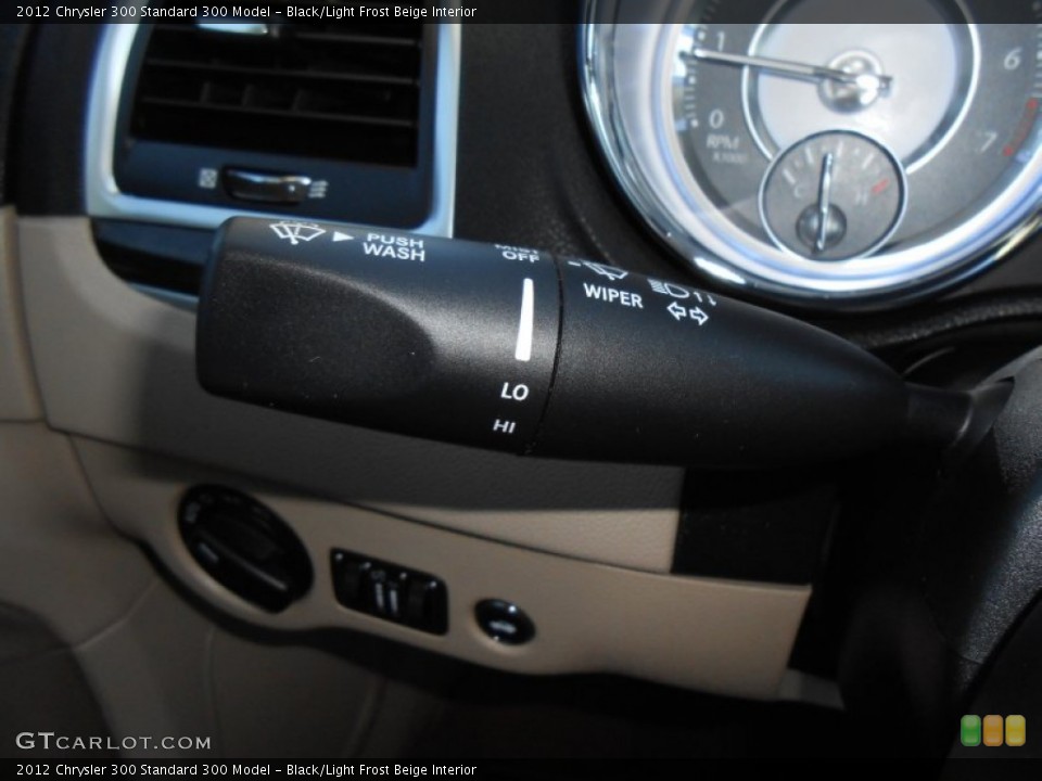 Black/Light Frost Beige Interior Controls for the 2012 Chrysler 300  #78360196