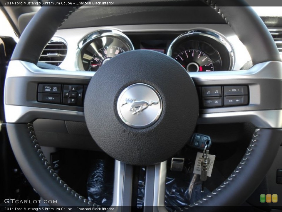 Charcoal Black Interior Steering Wheel for the 2014 Ford Mustang V6 Premium Coupe #78370176