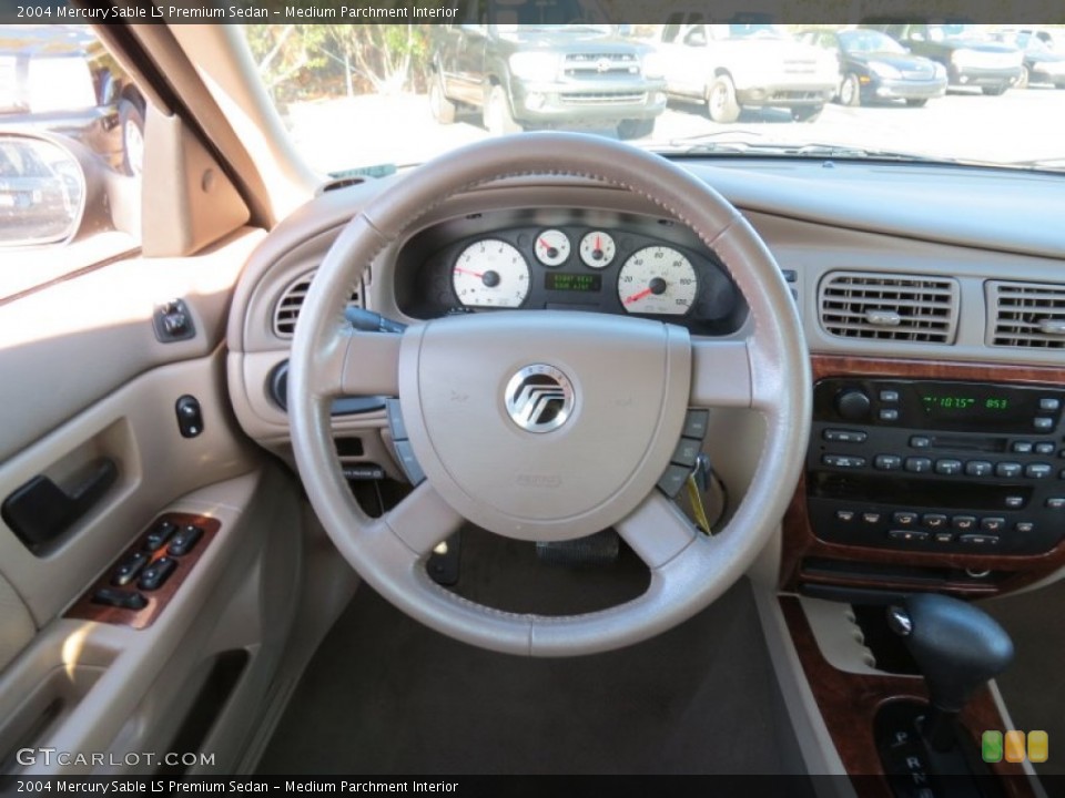 Medium Parchment Interior Steering Wheel for the 2004 Mercury Sable LS Premium Sedan #78370983