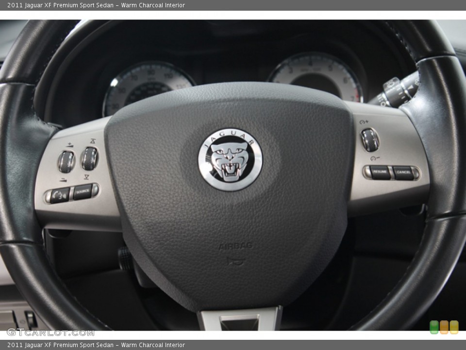 Warm Charcoal Interior Controls for the 2011 Jaguar XF Premium Sport Sedan #78382890
