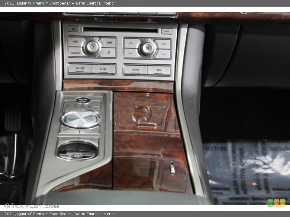Warm Charcoal Interior Controls for the 2011 Jaguar XF Premium Sport Sedan #78383004