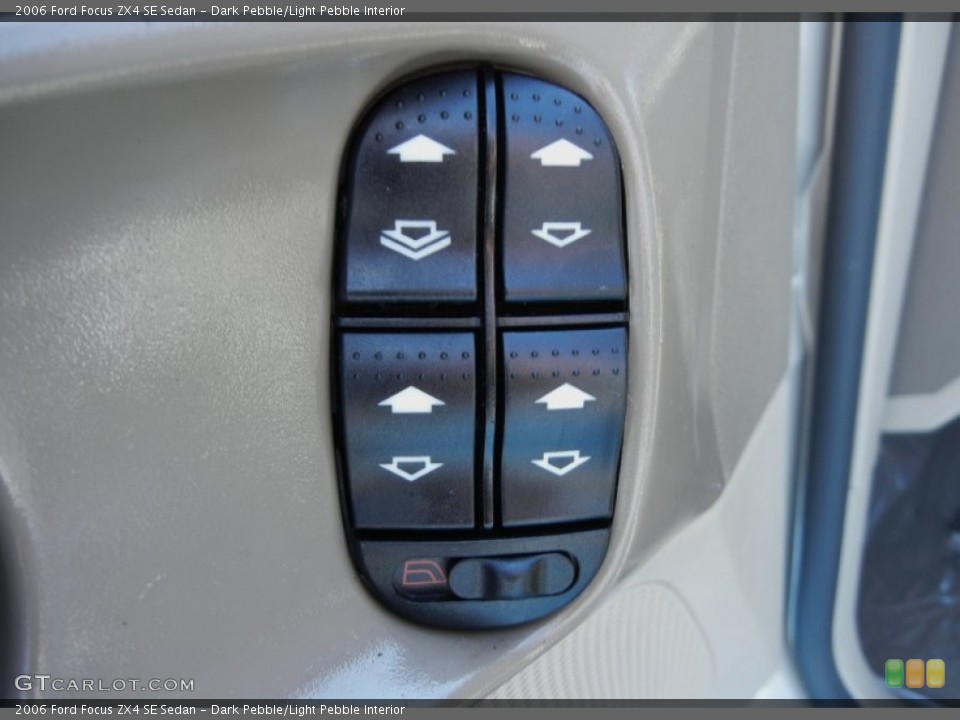 Dark Pebble/Light Pebble Interior Controls for the 2006 Ford Focus ZX4 SE Sedan #78386487