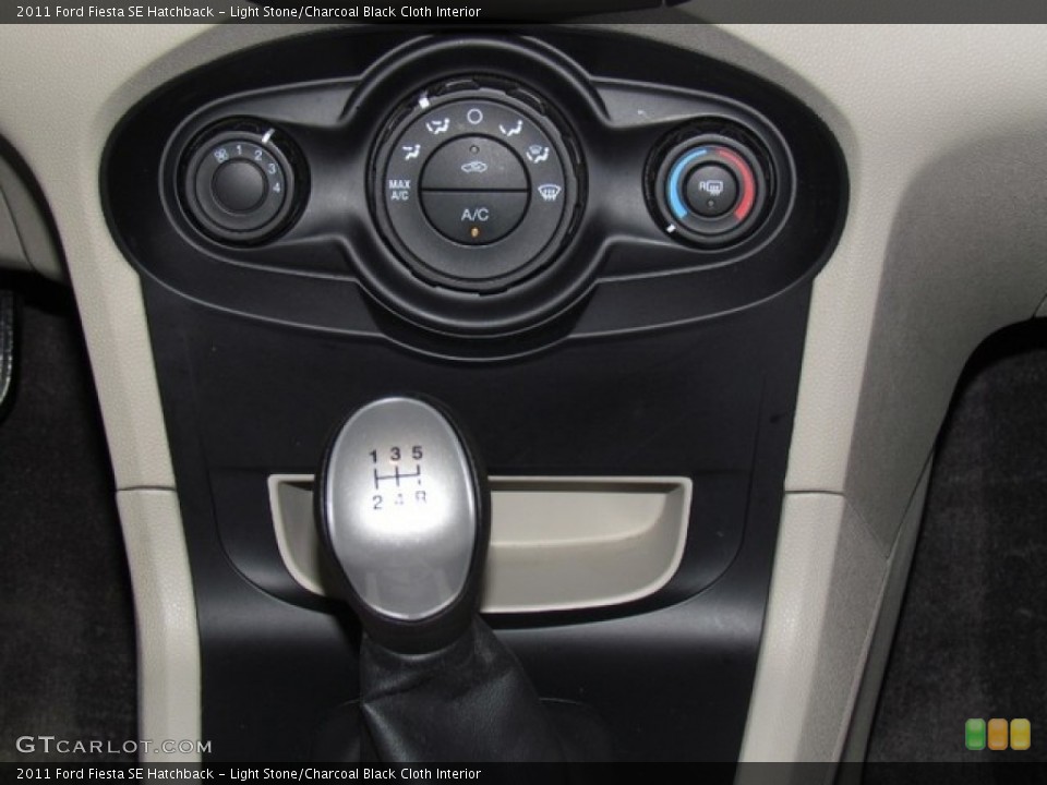 Light Stone/Charcoal Black Cloth Interior Controls for the 2011 Ford Fiesta SE Hatchback #78392485