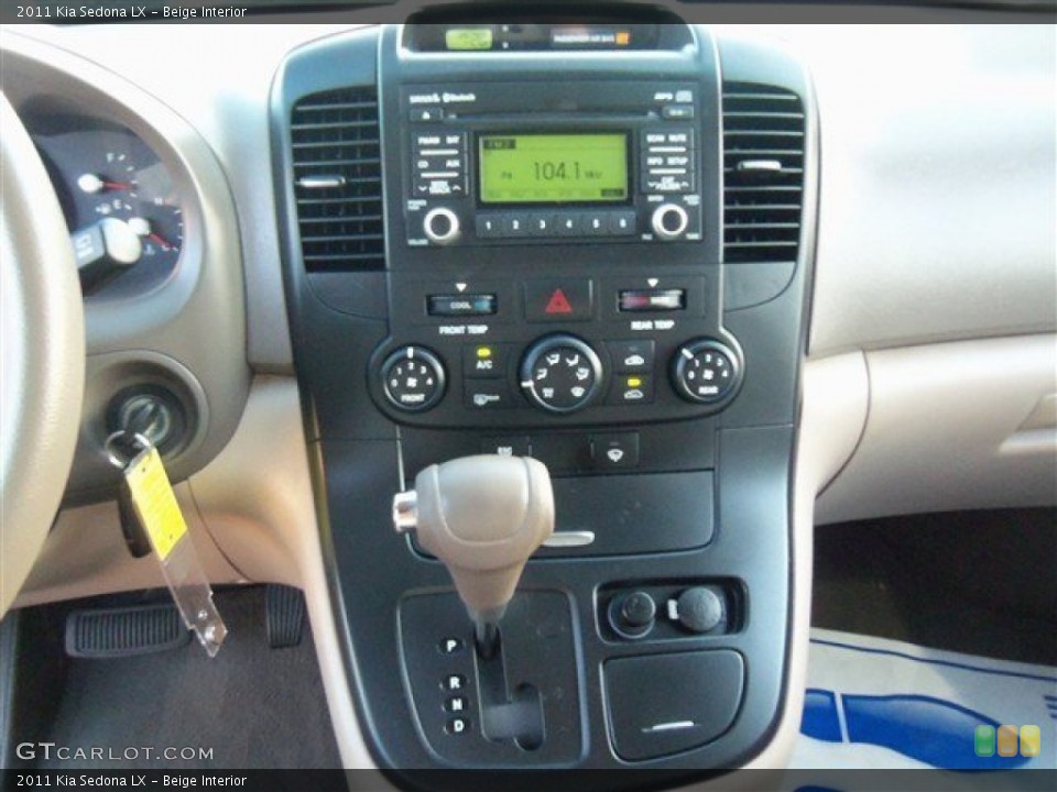 Beige Interior Controls for the 2011 Kia Sedona LX #78403079