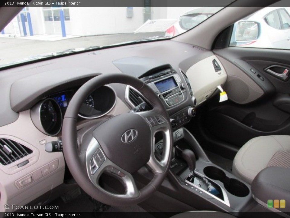 Taupe Interior Dashboard for the 2013 Hyundai Tucson GLS #78416441