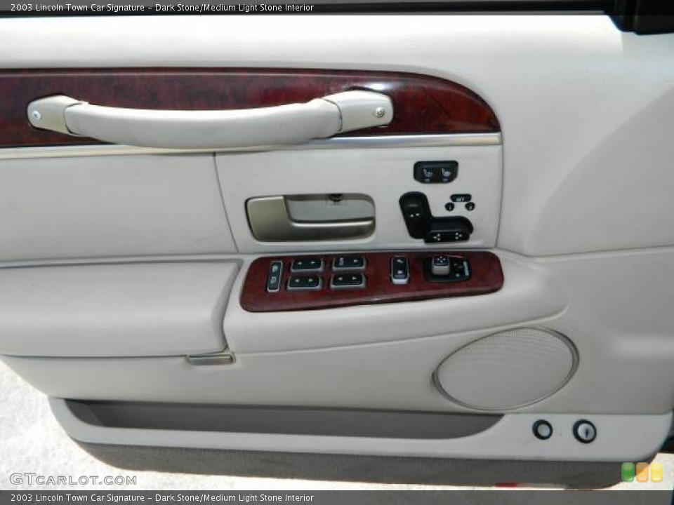 Dark Stone/Medium Light Stone Interior Door Panel for the 2003 Lincoln Town Car Signature #78419819