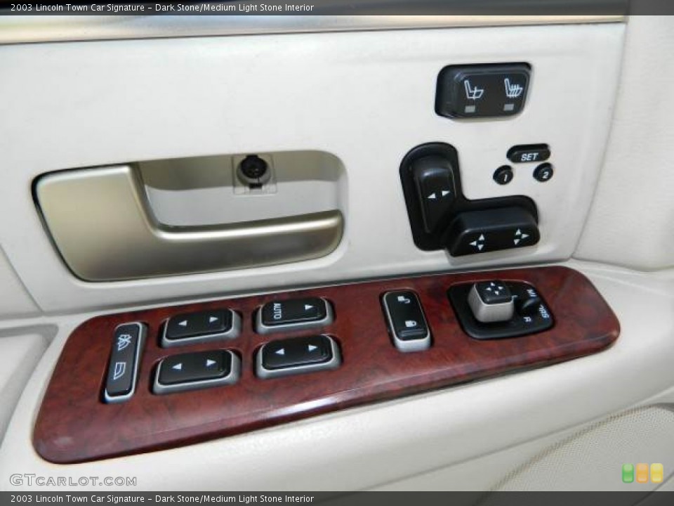 Dark Stone/Medium Light Stone Interior Controls for the 2003 Lincoln Town Car Signature #78419841