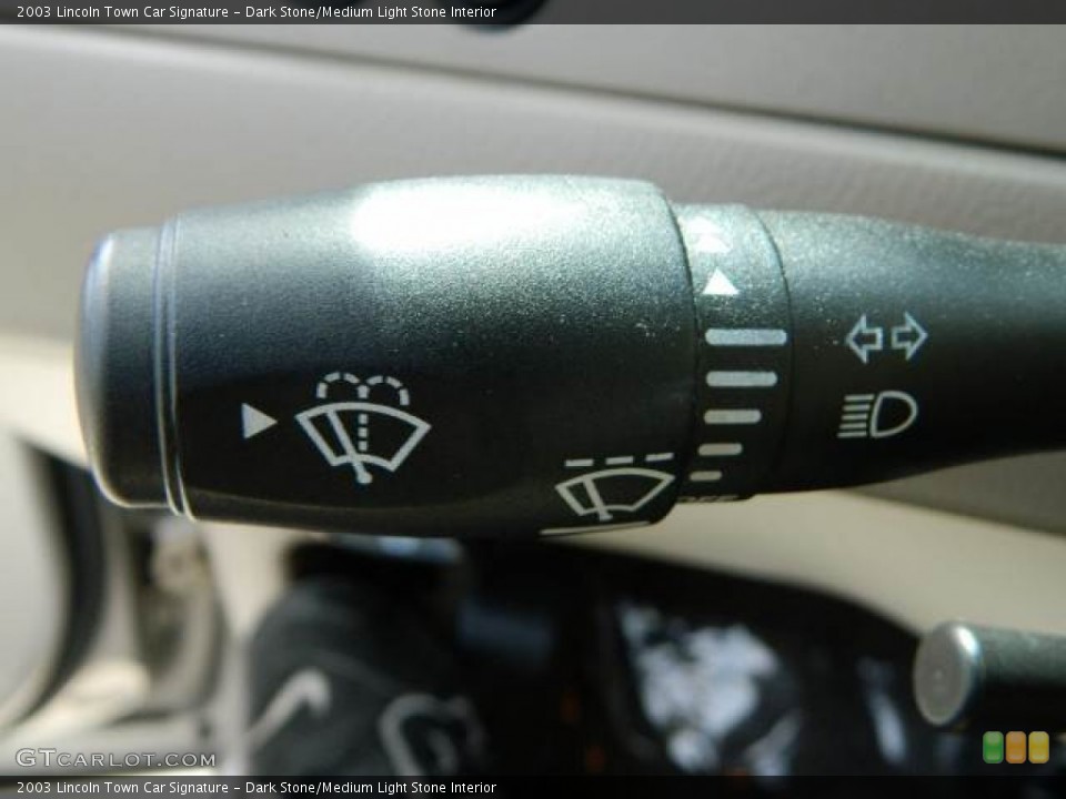 Dark Stone/Medium Light Stone Interior Controls for the 2003 Lincoln Town Car Signature #78419963