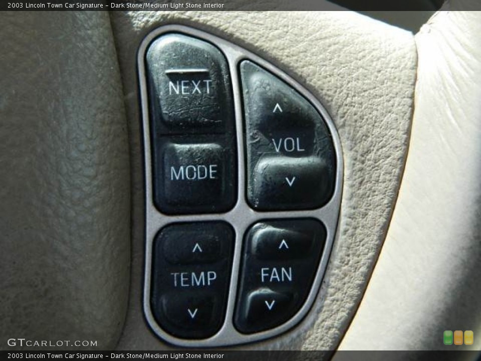 Dark Stone/Medium Light Stone Interior Controls for the 2003 Lincoln Town Car Signature #78419986