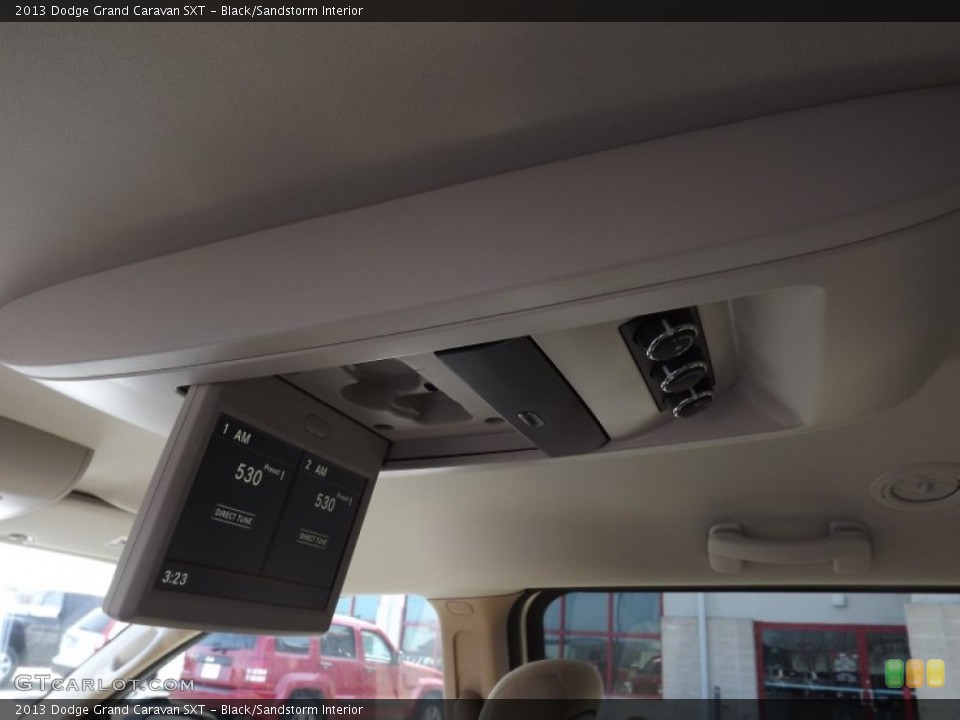 Black/Sandstorm Interior Entertainment System for the 2013 Dodge Grand Caravan SXT #78436721