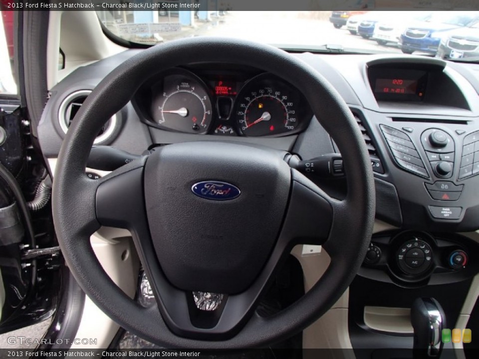 Charcoal Black/Light Stone Interior Steering Wheel for the 2013 Ford Fiesta S Hatchback #78452898