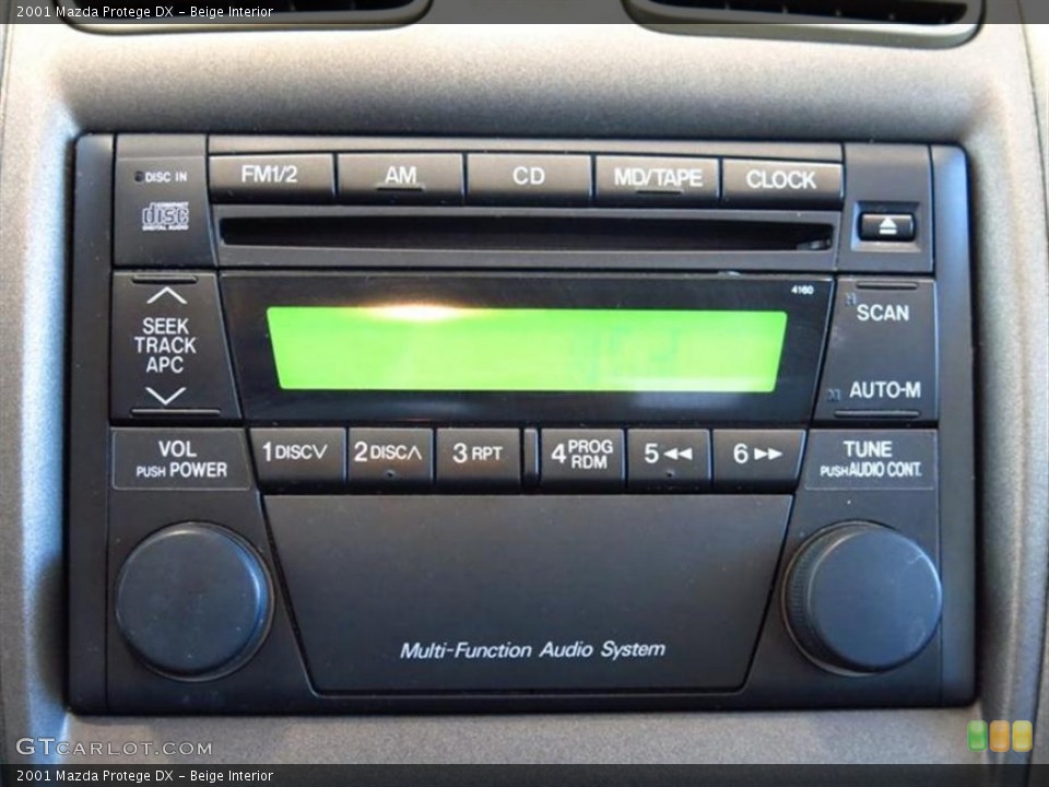 Beige Interior Audio System for the 2001 Mazda Protege DX #78466927