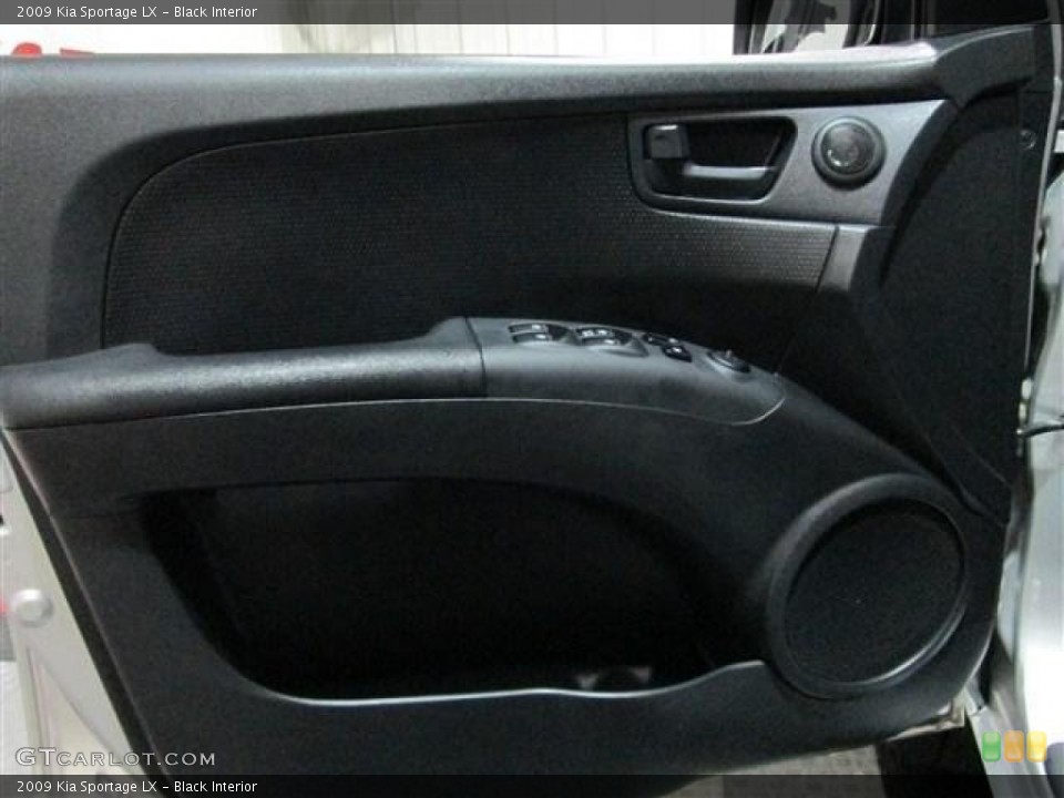 Black Interior Door Panel for the 2009 Kia Sportage LX #78472733