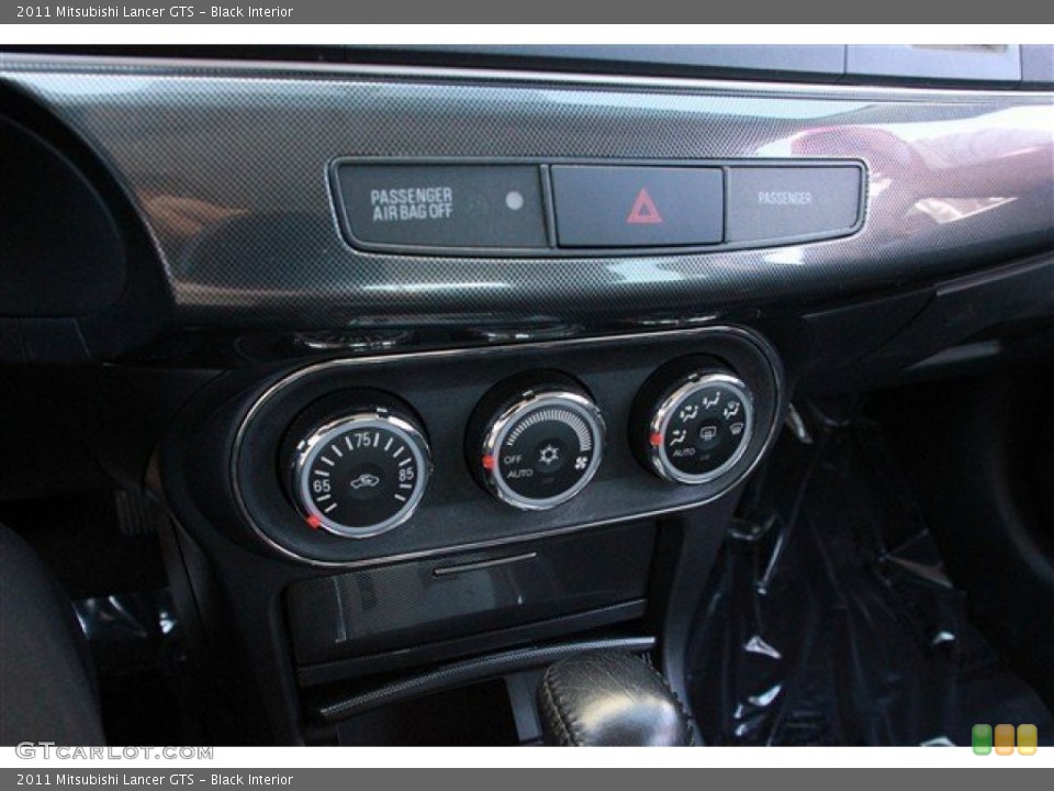 Black Interior Controls for the 2011 Mitsubishi Lancer GTS #78475493