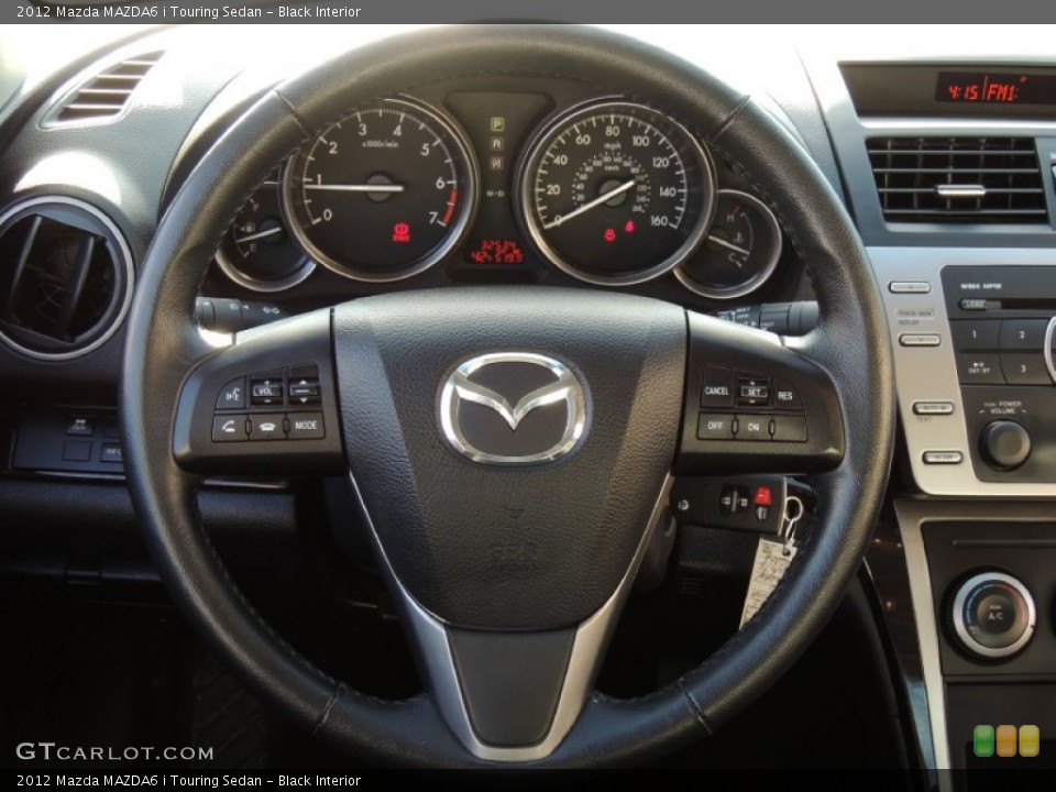 Black Interior Steering Wheel for the 2012 Mazda MAZDA6 i Touring Sedan #78492508