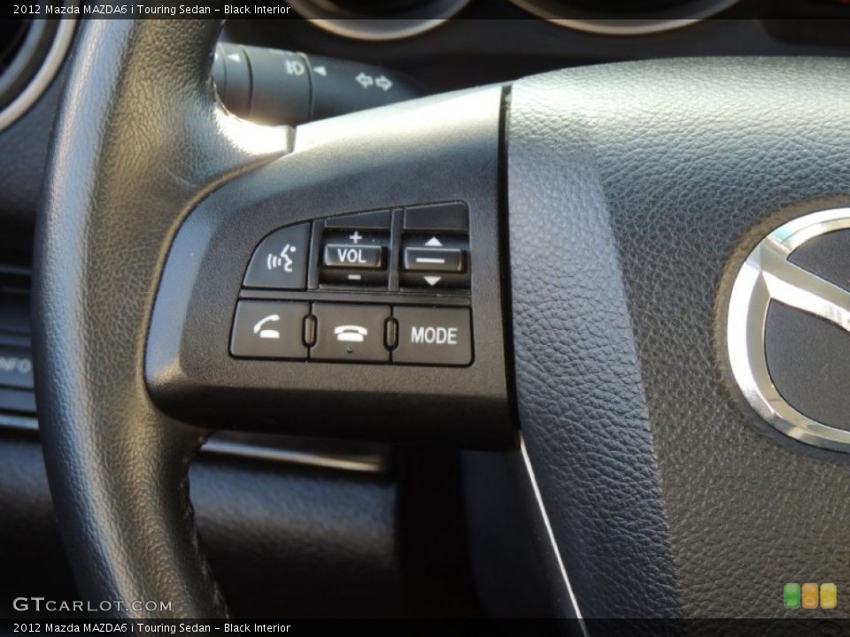 Black Interior Controls for the 2012 Mazda MAZDA6 i Touring Sedan #78492529