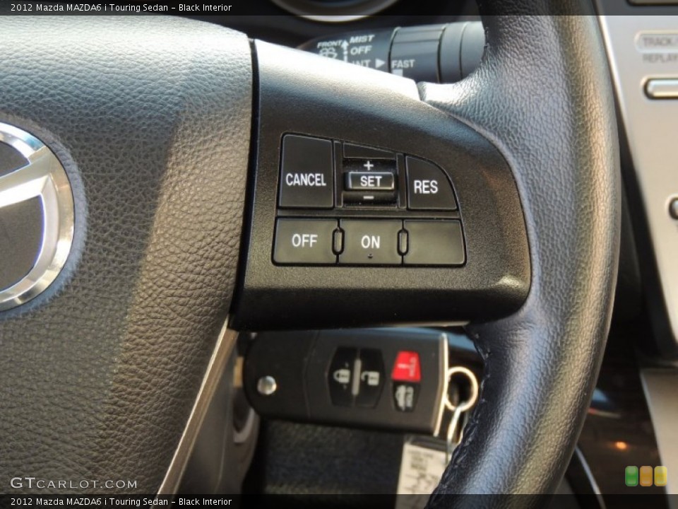 Black Interior Controls for the 2012 Mazda MAZDA6 i Touring Sedan #78492557