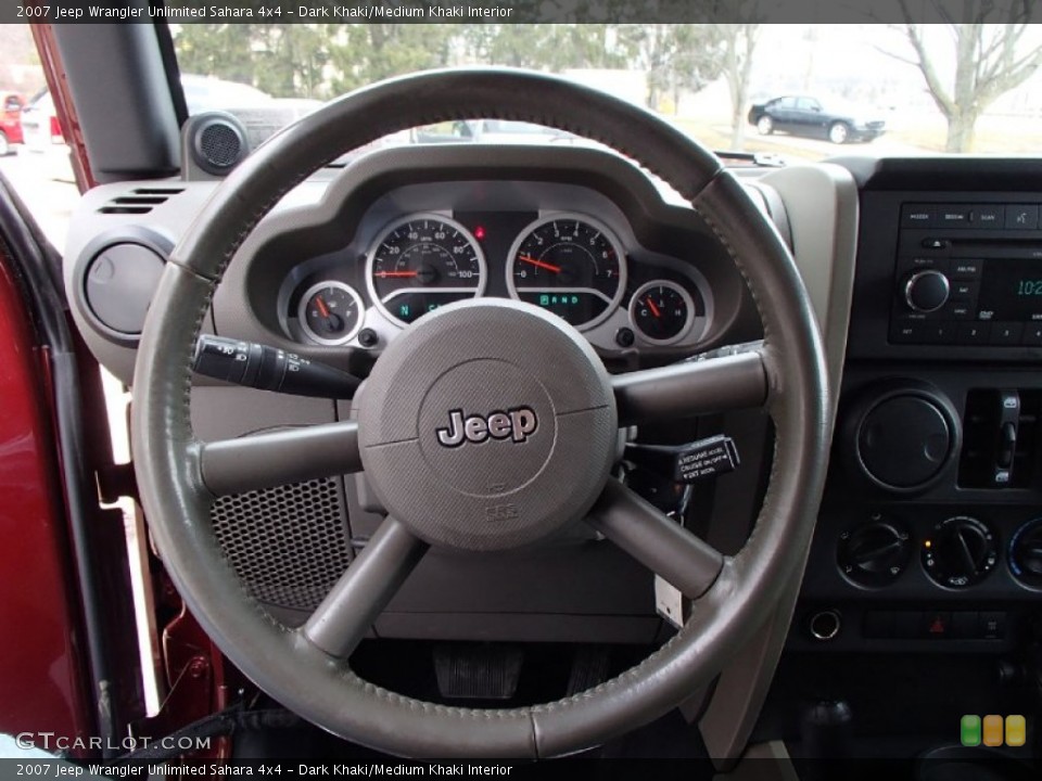 Dark Khaki/Medium Khaki Interior Steering Wheel for the 2007 Jeep Wrangler Unlimited Sahara 4x4 #78499546