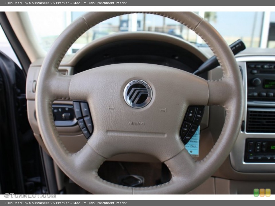 Medium Dark Parchment Interior Steering Wheel for the 2005 Mercury Mountaineer V6 Premier #78553955