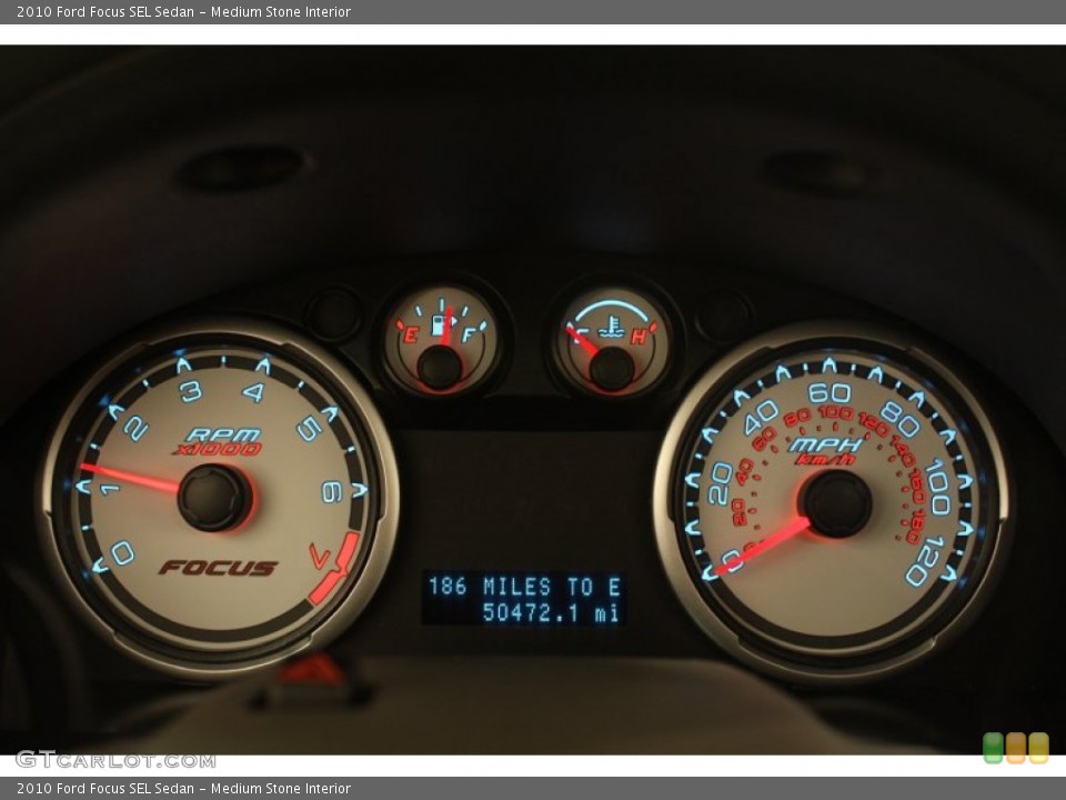 Medium Stone Interior Gauges for the 2010 Ford Focus SEL Sedan #78557306