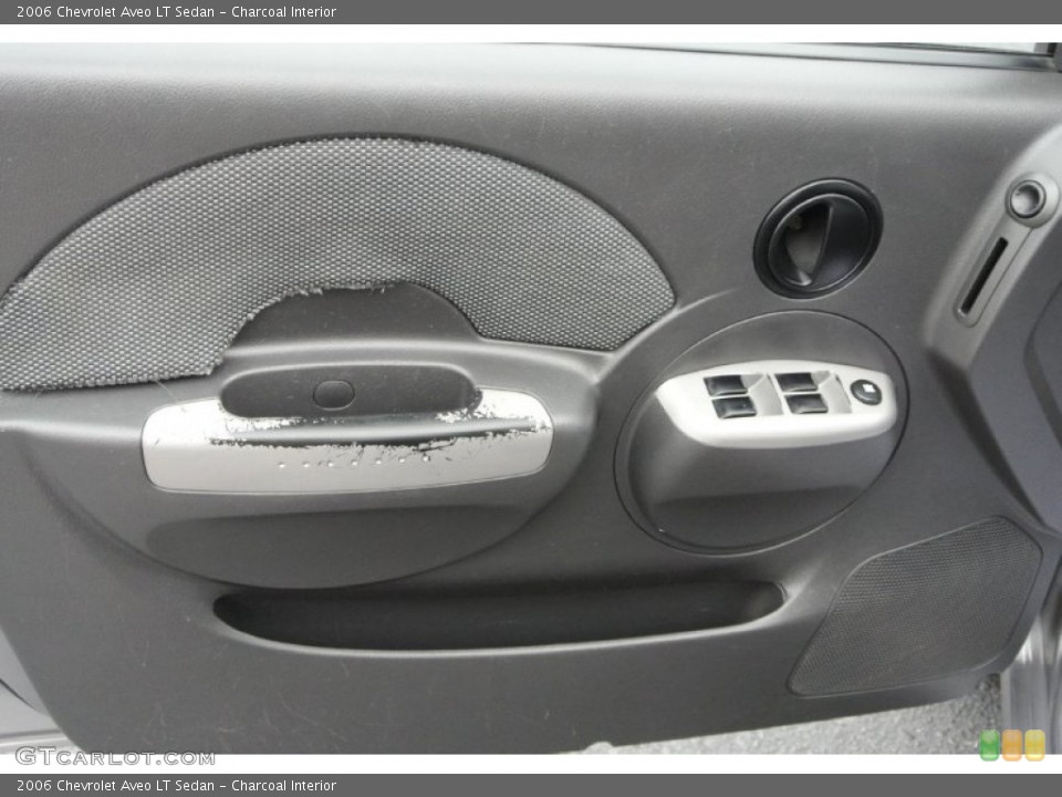 Charcoal Interior Door Panel for the 2006 Chevrolet Aveo LT Sedan #78579188
