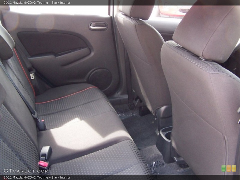 Black Interior Rear Seat for the 2011 Mazda MAZDA2 Touring #78586434