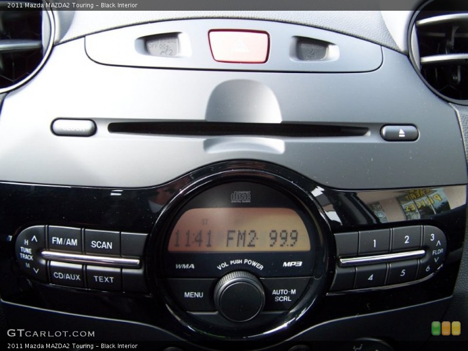 Black Interior Controls for the 2011 Mazda MAZDA2 Touring #78586501