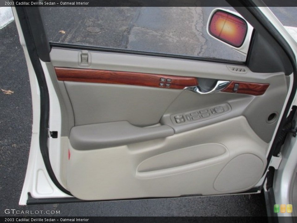 Oatmeal Interior Door Panel for the 2003 Cadillac DeVille Sedan #78621739