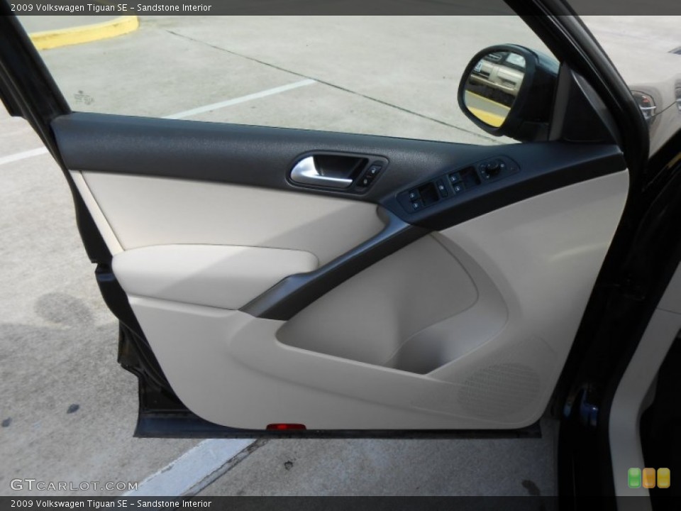 Sandstone Interior Door Panel for the 2009 Volkswagen Tiguan SE #78647045
