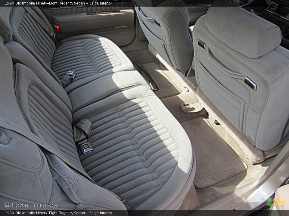 Beige Interior Rear Seat for the 1990 Oldsmobile Ninety-Eight Regency Sedan #78651769