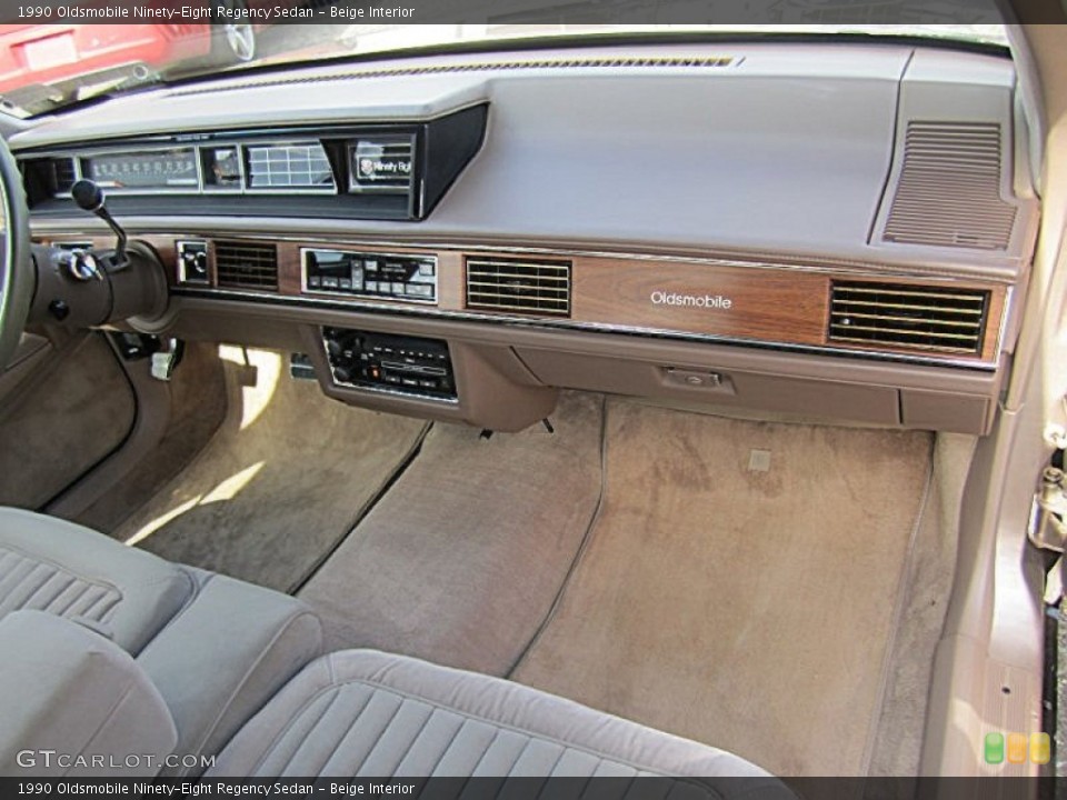 Beige Interior Dashboard for the 1990 Oldsmobile Ninety-Eight Regency Sedan #78651897